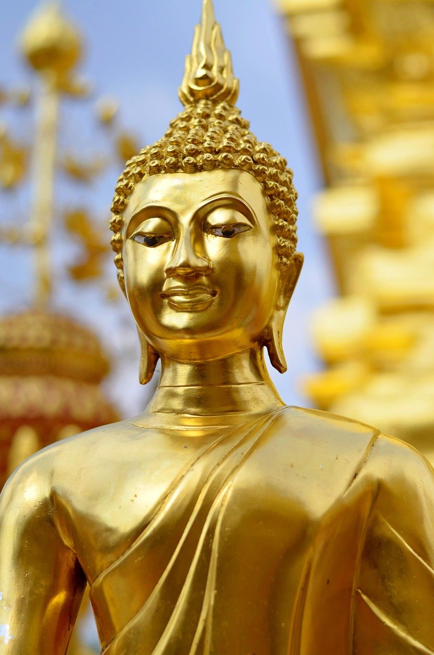 Thailand Hindu shrine temple golden devotion ritual prayer
