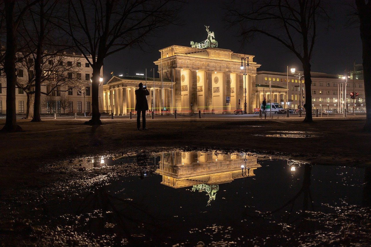 Brandenburg Gate Berlin by night, near the Holocaust Memorial in the government district