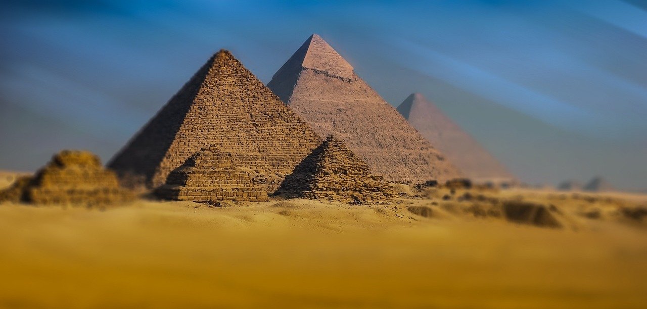 Giza pyramid complex Egypt ancient monuments desert sand
