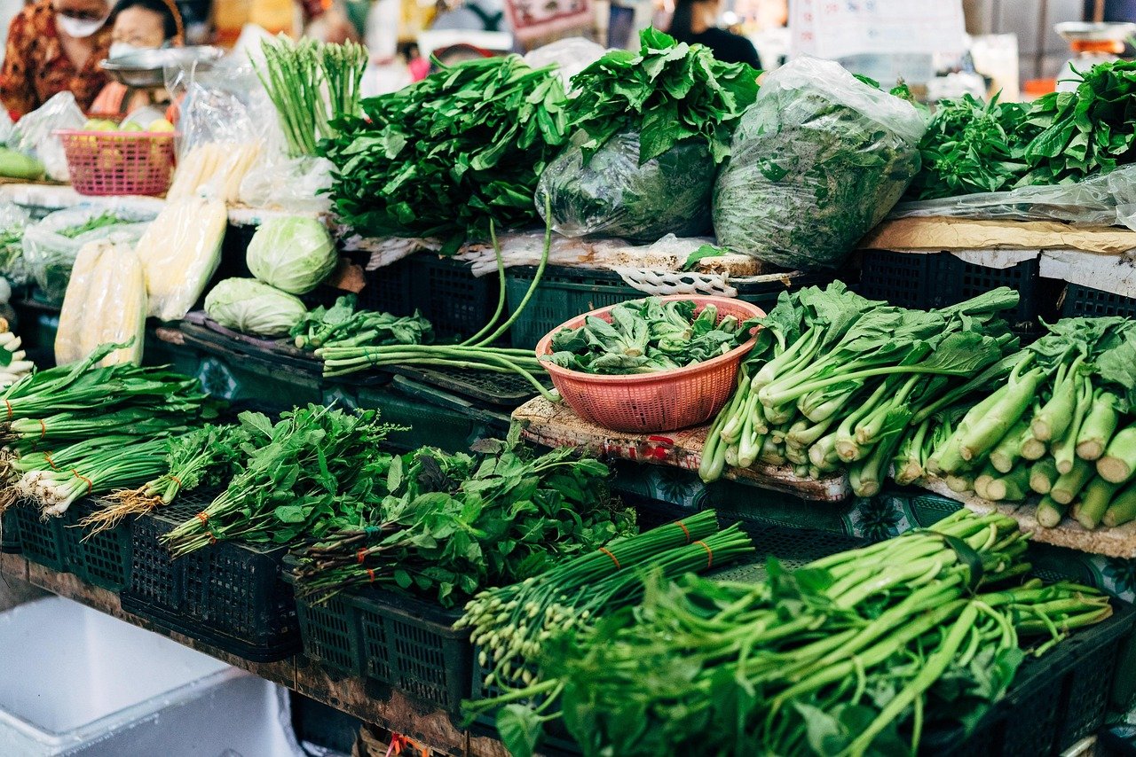 Bangkok market stalls with fresh vegetables and produce Thailand