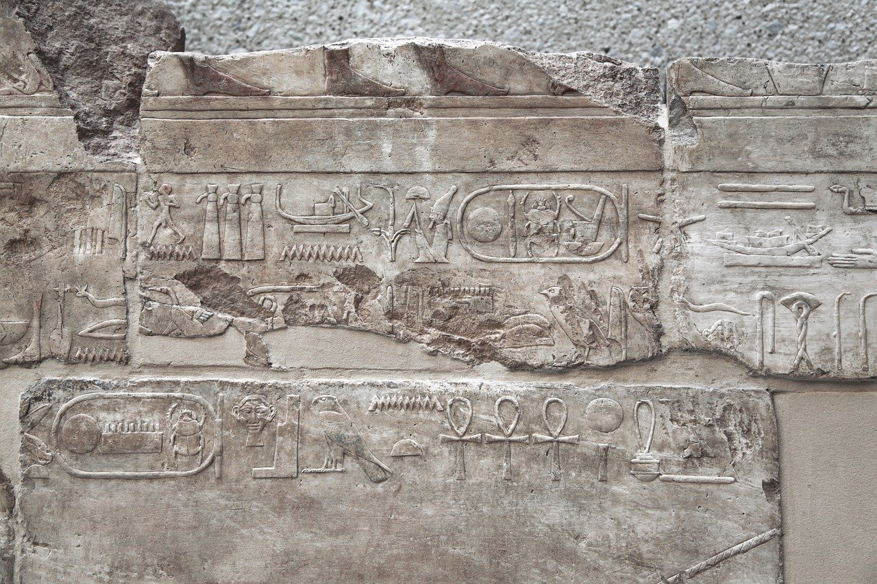 Ancient Egyptian hieroglyphics carved in granite stone