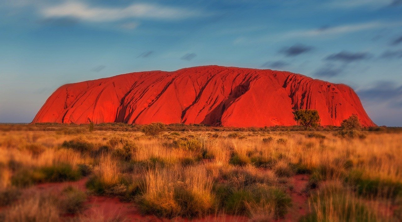 Spiritual sunrise landscape at Uluru sacred Aboriginal site Australia