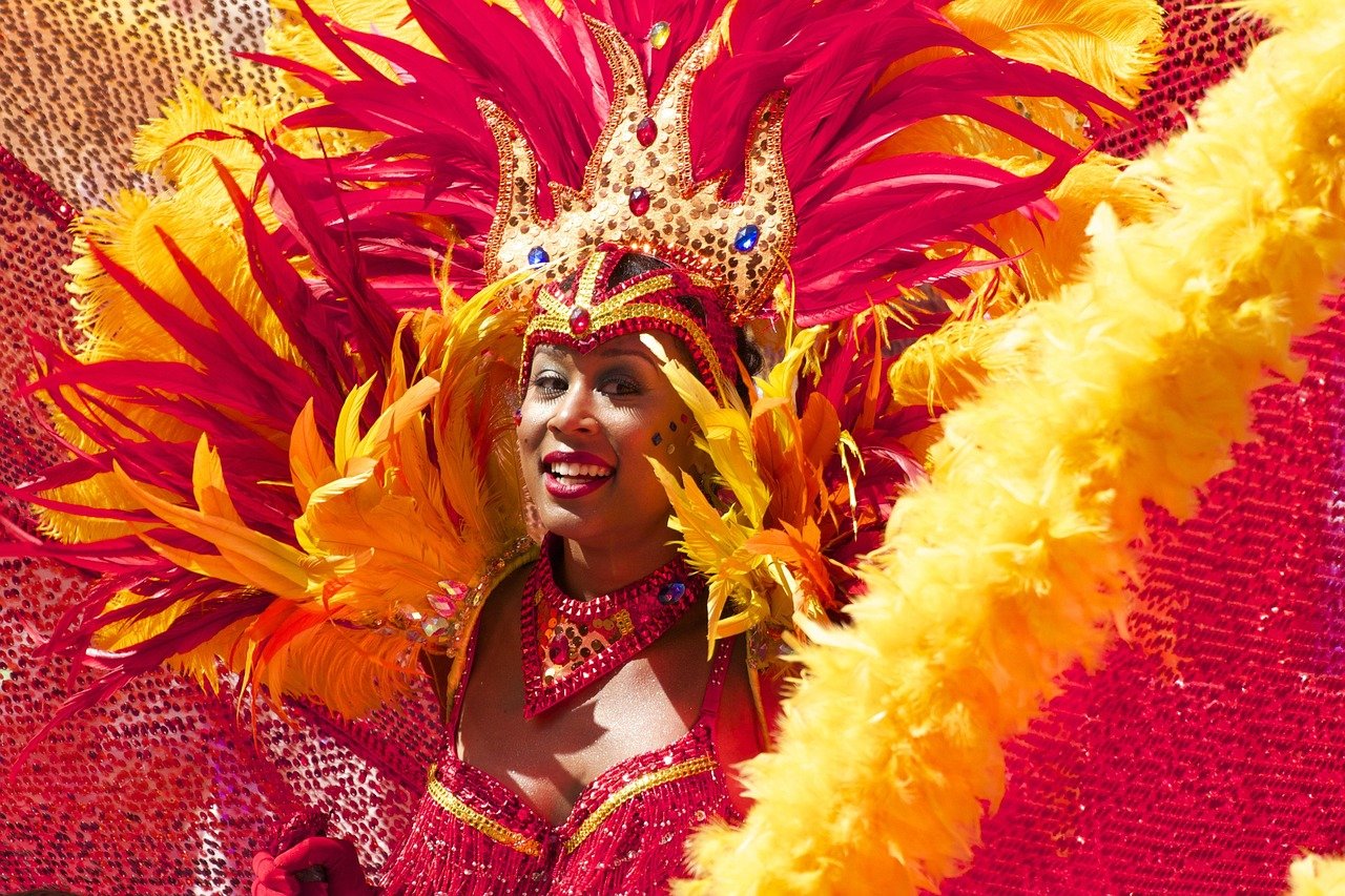 carnival costume feathers parade performer colorful orange
