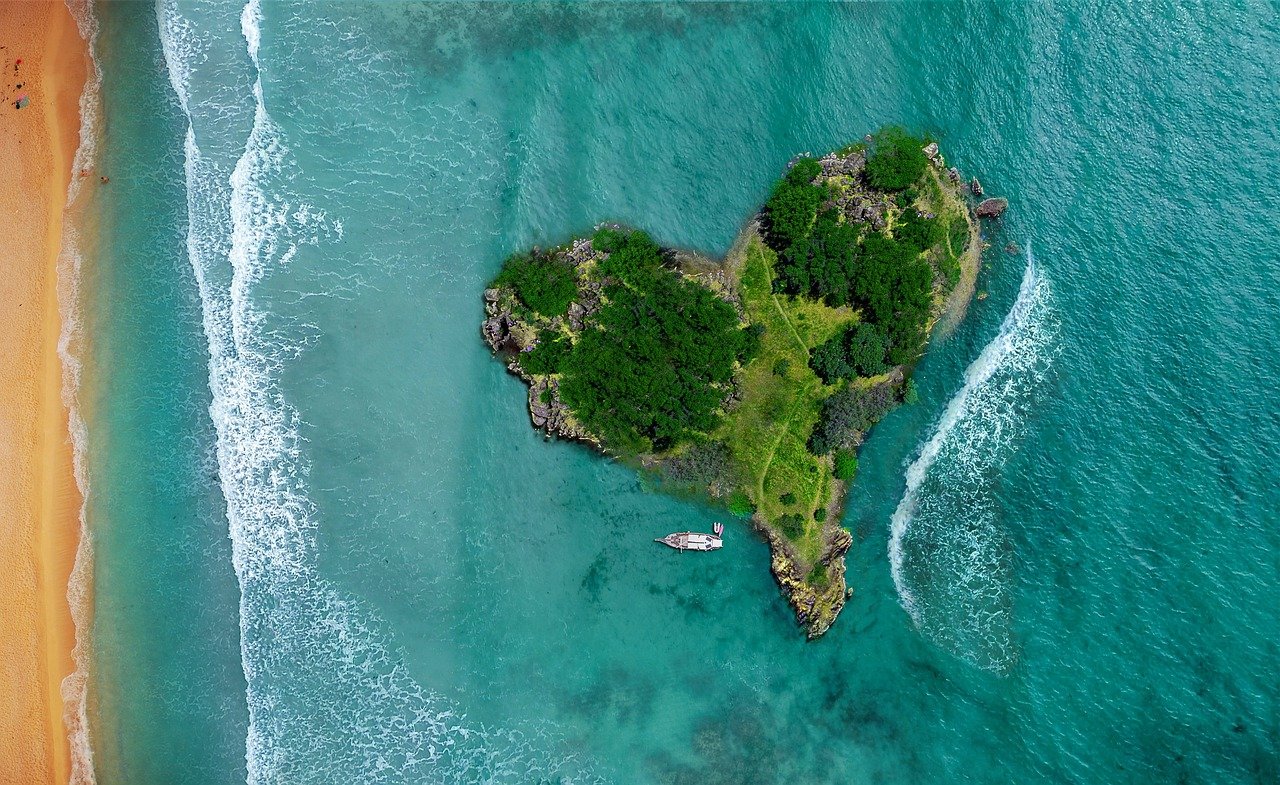 Tropical Australian island with coral sea aerial view Queensland