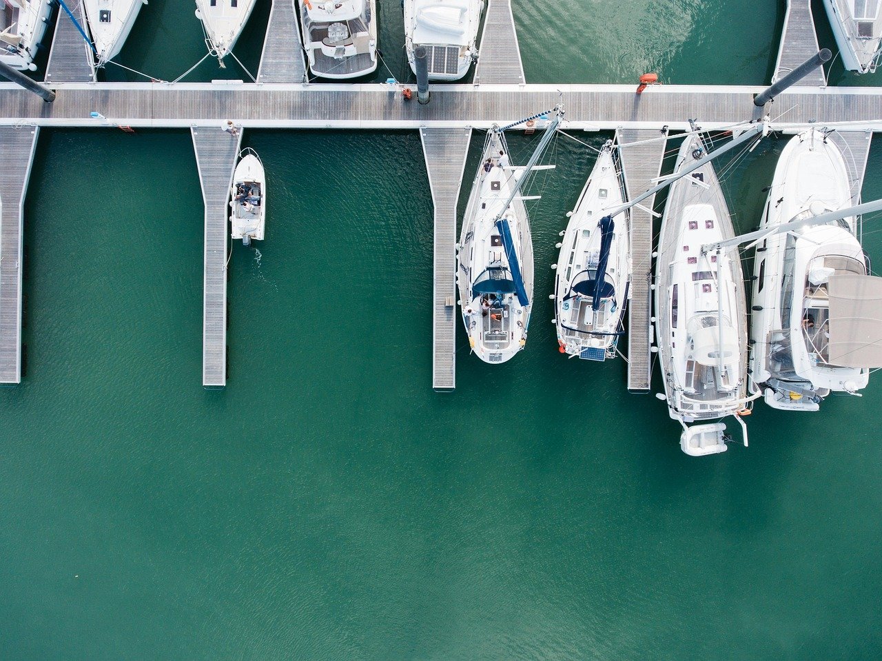 Marina yachts dock luxury harbour aerial view