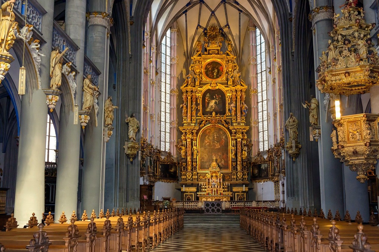 Catholic church interior marble altar gold ornate sanctuary