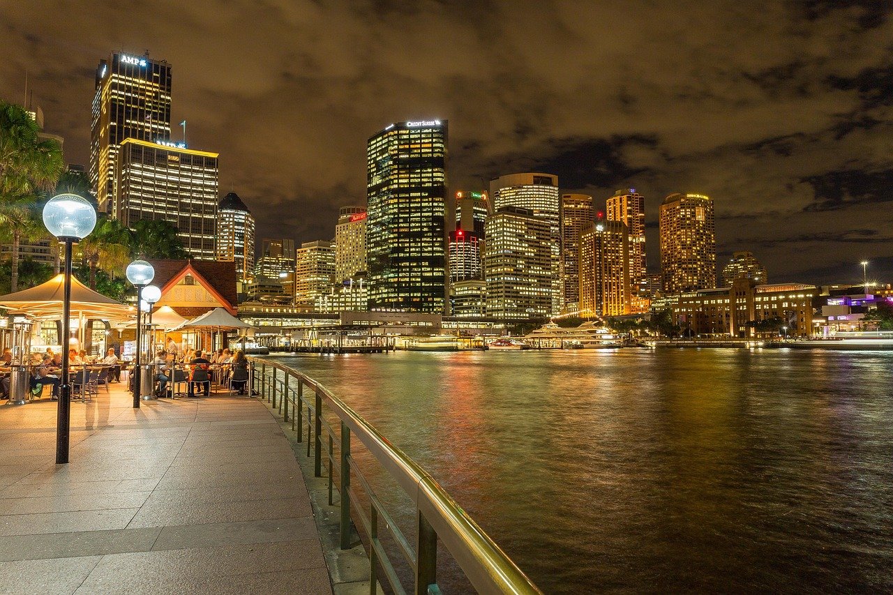 Sydney Harbour Bridge and Circular Quay skyline at dusk